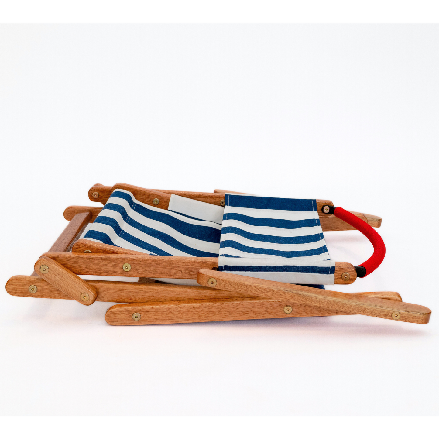 Blue and white striped folding picnic chair with red handle bar