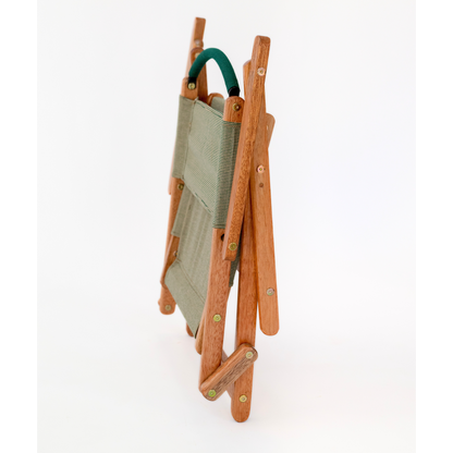 green folding camping chair